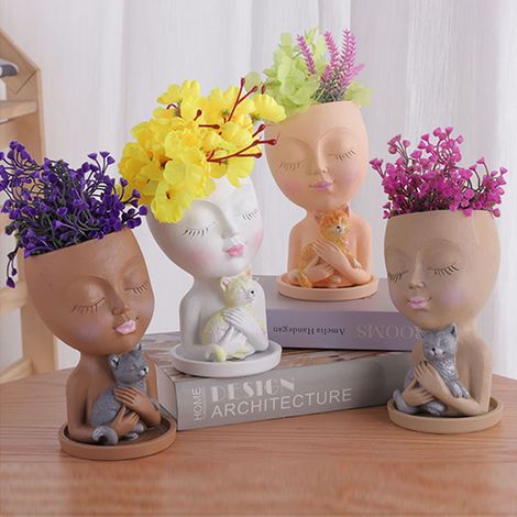 Pot de fleurs à double tête humaine, artisanat en résine, composition florale