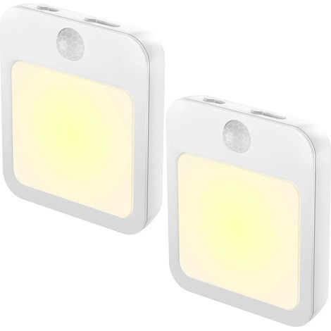 Dos luces nocturnas LED con sensores de movimiento y luz, ambas enchufables, de luz cálida. (1/4)