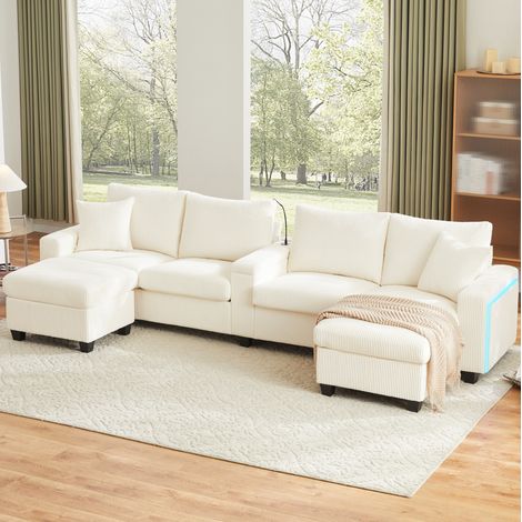 Canapé d’angle en U 334 x 128,5 x 81 cm en tissu beige avec rangement, LED, USB/Type-C et 2 poufs (1/5)