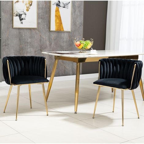 Silla de comedor tapizada, respaldo curvo tejido, terciopelo negro y patas metálicas doradas (1/5)