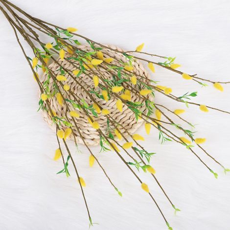 Branche de camélia artificiel jaune, flexible et décorative, idéale pour les compositions florales et les loisirs créatifs. (1/5)