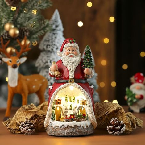 JSSEVN - Weihnachtsdorf mit Lichtern und Musik. Beleuchtetes LED-Haus. Eisenbahn-Design mit Musik. Spieluhr (Weihnachtsmann-Edition). (1/5)
