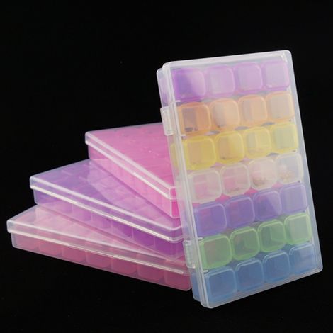Boîte de rangement transparente à 28 compartiments pour accessoires de manucure et bijoux, résistante aux chocs, avec couvercle. (1/5)