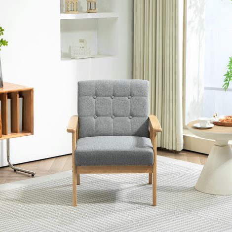 Poltrona lounge rivestita in lino con braccioli e struttura in legno di caucciù, portata massima 130 kg, colore grigio chiaro.