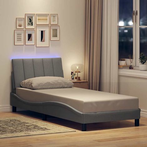 Cadre de lit avec tête de lit et LED 90 x 200 cm gris clair en tissu, sans matelas - PANGIVO (1/5)