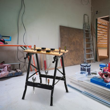 Établi pliant portable DURHAND avec 4 trous pour serre-joints et scie, pour la menuiserie à domicile. Structure en fer et MDF, supporte jusqu'à 70 kg, dimensions : 56 x 62 x 75 cm, noir naturel.