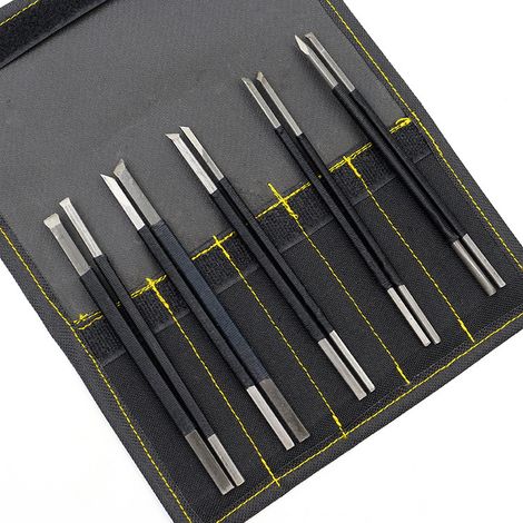 Otras herramientas especializadas: Un juego de 10 herramientas de acero con alto contenido de carbono para tallar piedra, con bordes negros. (1/5)