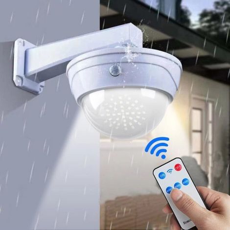 Trade Shop - Camara Falsa Con Panel Solar Con Sensor De Movimiento Foco 44led - (1/4)