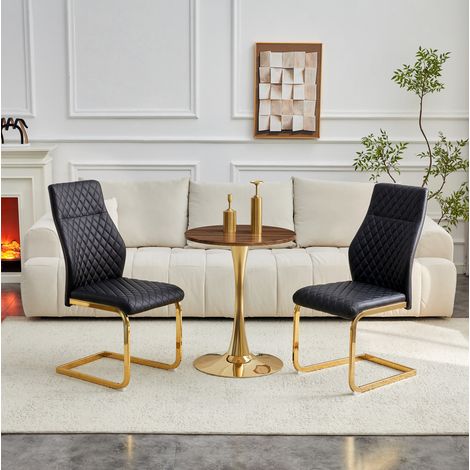 Conjunto mesa redonda de 60 cm en MDF efecto nogal, 2 sillas negras, patas doradas (1/5)