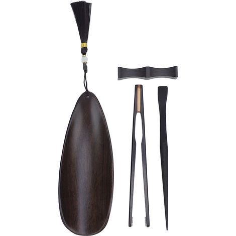 Service à thé comprenant une cuillère en bois, un support avec pinces et d'élégants accessoires en bois noir. (1/5)