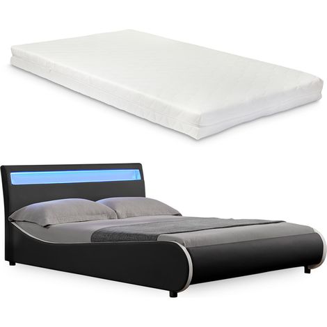 Lit capitonné à LED de Corium 'Valencia' avec matelas (140x200cm)(noir)(mousse froide) - avec cuir synthétique / housse en cuir synthétique / éclairage RVB / avec sommier à lattes /