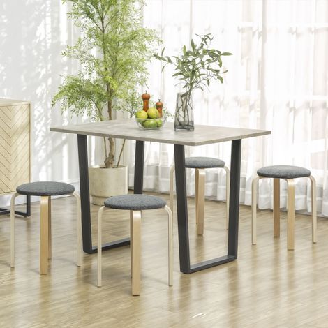 Ensemble de 4 tabourets empilables ronds sans dossier avec assise rembourrée. 40 x 40 x 45 cm. gris