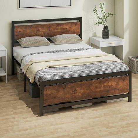 Struttura letto matrimoniale in acciaio marrone rustico con rete a doghe e testiera, compatibile con materasso di 190 x 140 cm.