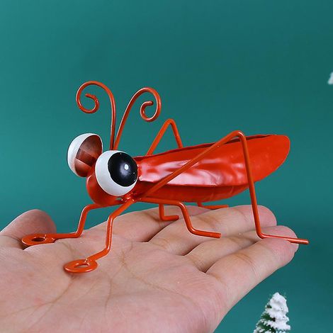 Sculpture murale en métal représentant une sauterelle, pour la décoration intérieure et extérieure. (1/4)