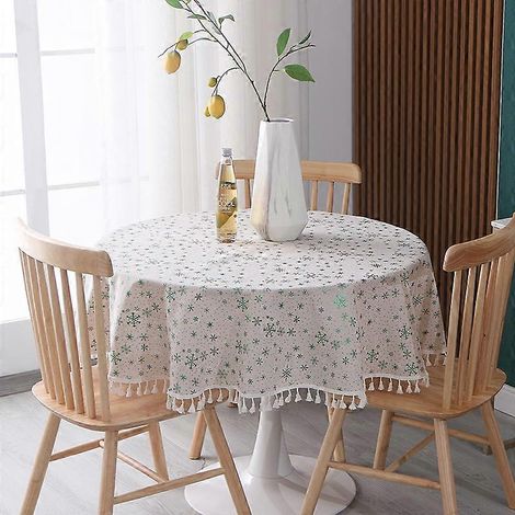Nappe ronde moderne et simple de Noël, en coton et lin imprimé à chaud, avec pompons, idéale pour une table basse ou un salon. Motif flocon de neige vert. (1/5)