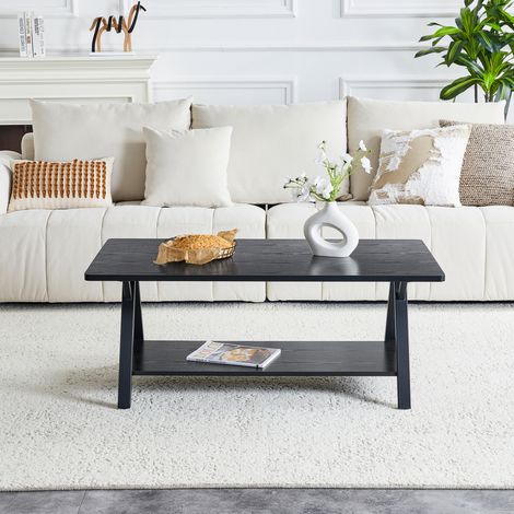 Table basse industrielle 110x57x44,5 cm noire en MDF et métal avec rangement et structure stable (1/5)