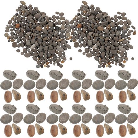 Un sachet contenant des éléments de décor miniatures pour paysages, des pierres miniatures, des galets naturels, du sable miniature et des décorations de table. (1/5)