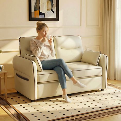 Canapé 2 places Beige simili cuir rembourrage épais poche latérale coussins 136x81x90 cm