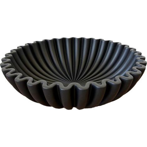 Bol décoratif à bord noir. bol ondulé en résine. style moderne pour salon. maison ou bureau