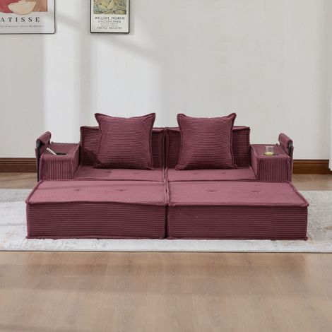 Canapé-lit deux places, composé d'un confortable canapé en tissu deux places et de deux coussins décoratifs. Inclut un élégant pouf décoratif doté d'un espace de rangement latéral et d'un porte-gobele (1/4)