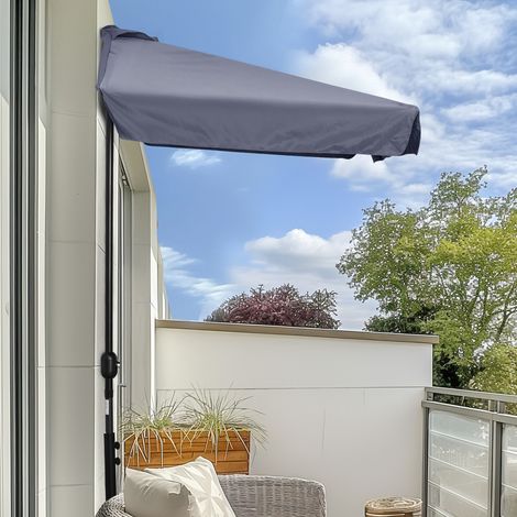 Parasol mural semi-circulaire, 2,5 x 2,3 m, ouverture à manivelle, en métal et polyester. Gris.