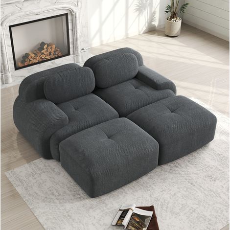 Divano angolare modulare in velluto a coste grigio, senza struttura, con braccioli ergonomici e base antiscivolo (1/5)