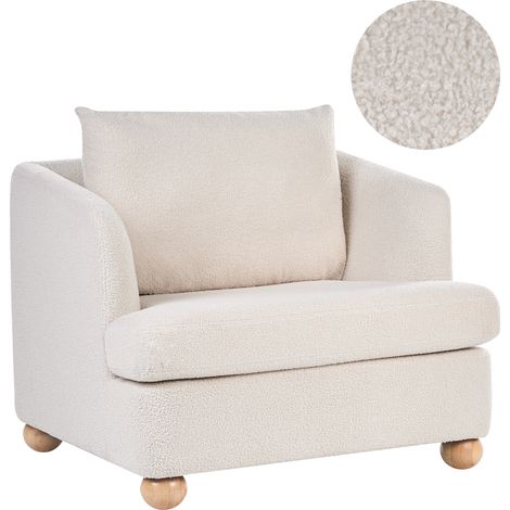 Sillón con tapizado de bouclé reposabrazos y patas redondas de madera salón blanco crema Rattvik
