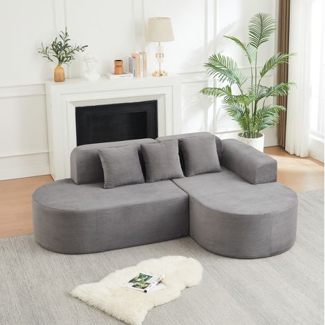 Modernes, 220 cm langes L-förmiges Modul-Sofa aus Cord mit geschwungenen Rückenlehnen und Armlehnen, ausgestattet mit drei Kissen geeignet für Wohnzimmer, Spielzimmer und Aufenthaltsräume (1/5)
