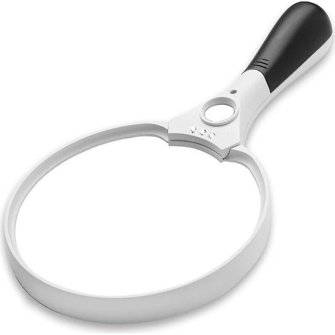Loupe menée tenue dans la main de CREA avec la lumière pour lire le grossissement 2x 4x 10x