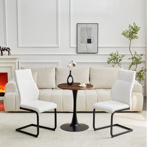 Set tavolo rotondo 60 cm in MDF con 2 sedie bianche in PU e metallo nero (1/5)