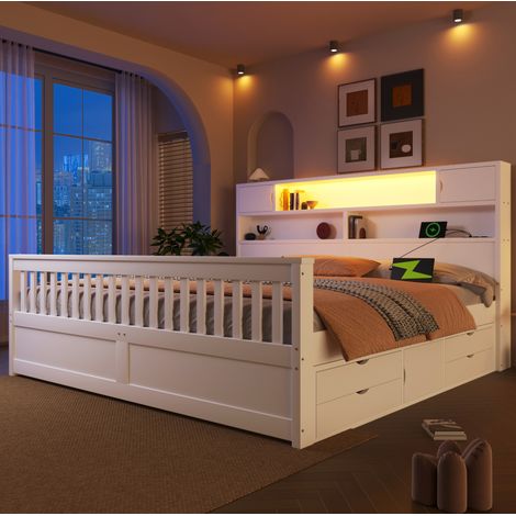 Letto a piattaforma in MDF e compensato bianco, 180x200 cm, con testiera contenitore, illuminazione a LED e 4 cassetti. (1/5)
