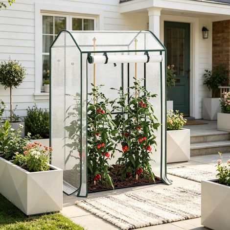 Une serre résistante, une tente d'hiver pour plantes avec une porte avant zippée enroulable, pour balcon, terrasse, jardin.