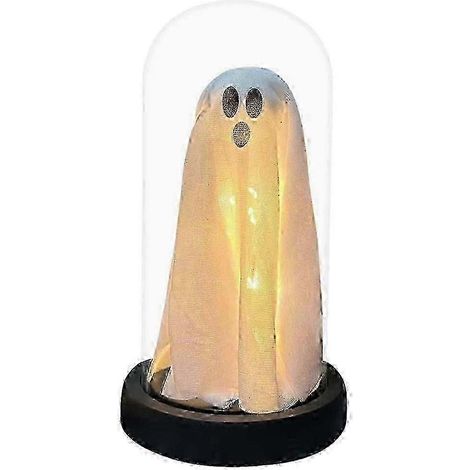 Des fantômes lumineux sous des cloches en verre décoratives pour Halloween, de jolis fantômes illuminés dans la cheminée. (1/5)