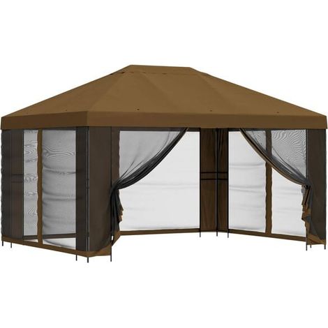 Le chalet de jardin a des murs de 4 x 3 mètres et est construit en fibre de polyester gris-brun et en acier. (1/5)
