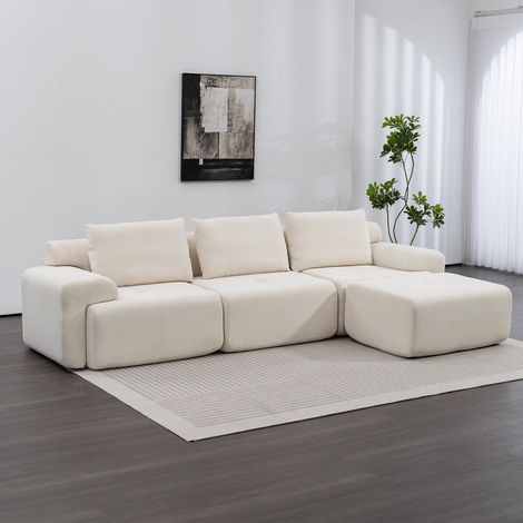 Ce canapé d'angle en L pour le salon est garni de mousse à mémoire de forme, ne nécessite aucun montage et se transforme en lit. Revêtu de velours côtelé et doté d'un design modulable, (1/5)