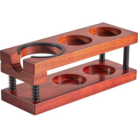 Estación de prensado de café espresso de doble etapa para portafiltros universales de 51-58 mm, fabricada en madera natural con soporte dispensador ajustable y patas de silicona antideslizantes.