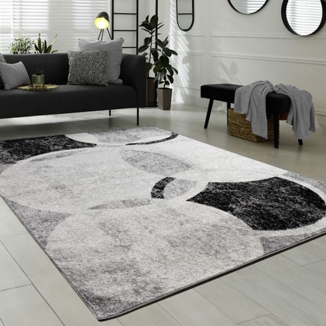 Tappeto di design contemporaneo con cerchi marmorizzati in grigio, nero e crema, 60x100 cm