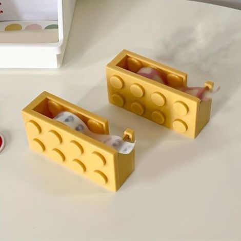 Déchire-ruban adhésif en forme de blocs de construction, petit porte-ruban adhésif, porte-ruban adhésif créatif, joli porte-ruban adhésif, jaune. (1/3)