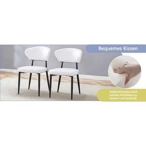 Chaise de salle à manger ergonomique blanche au design minimaliste et au dossier incurvé, offrant un confort optimal et une élégance sobre, pour une posture assise inédite. Vendue par lot de 2. (1/5)