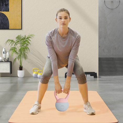 Kettlebell rempli 6 kg 19x19x28 cm rose de sable métallique et manche antidérapante pour l’entraînement à domicile (1/4)