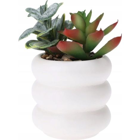 Planta artificial en una maceta de cerámica de 14 cm.