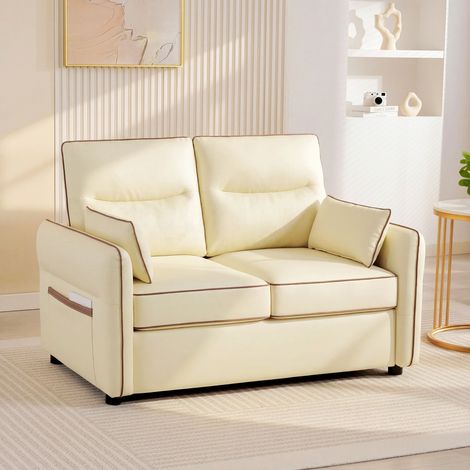 Sofá de 2 plazas de polipiel con acolchado grueso, bolsillo lateral y 2 cojines, 136x81x90 cm, color beige.