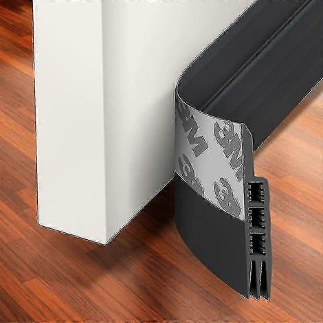 Bande isolante adhésive pour bas de porte, joint étanche anti-bruit et thermique, protection contre courants d'air, pose facile sans outils, modèle renforcé pour isolation optimale. (1/4)