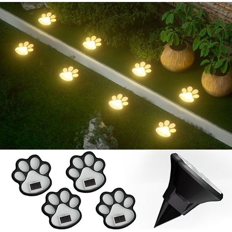 Luci solari da giardino, set da 4. Luci decorative da giardino a energia solare a forma di zampa di cane per uso esterno. Luce bianca calda. (1/5)