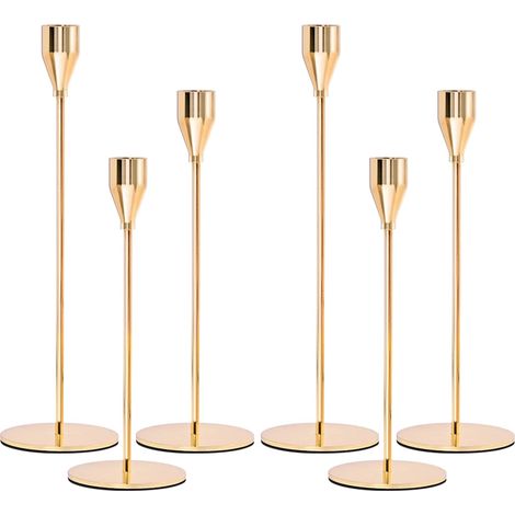 Ein Set aus 6 goldenen und silbernen Kerzenleuchtern (Gold) (1/4)