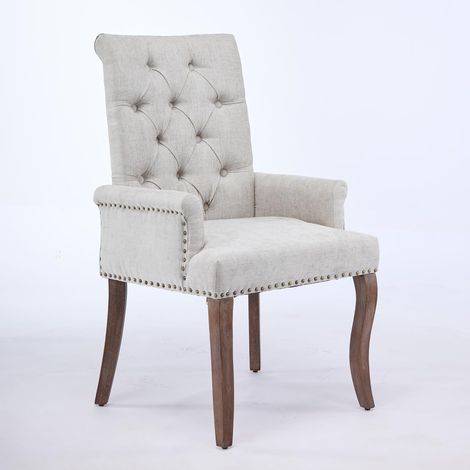 Chaises de salle à manger en tissu chenille beige, avec pieds incurvés en bois massif, accoudoirs et détails de boutons (1/5)