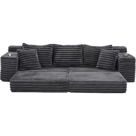 Divano letto in velluto a coste grigio scuro con schienale alto, cuscini, tasche e portabicchieri (1/5)