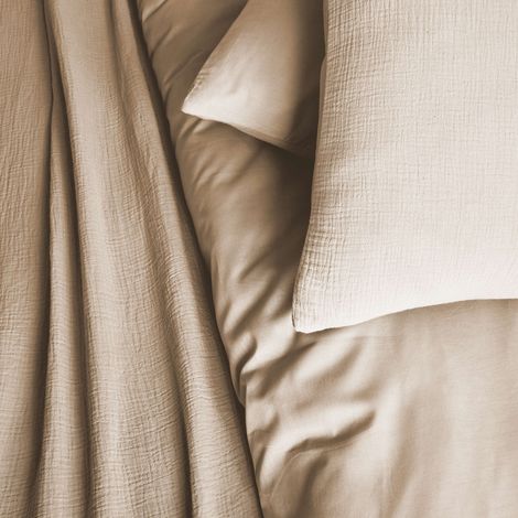 Ropa de cama de gasa y algodón beige