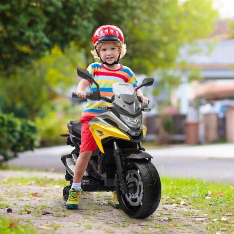 Moto eléctrica infantil, Honda, 3 km/h, música y luces, de 3 a 6 años, hasta 30 kg, amarilla