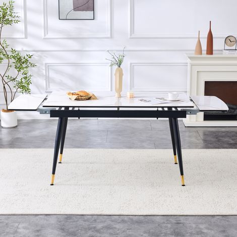 Table à manger extensible avec plateau en céramique blanche effet marbre et pieds métalliques noirs et dorés, 140-200 cm (1/5)